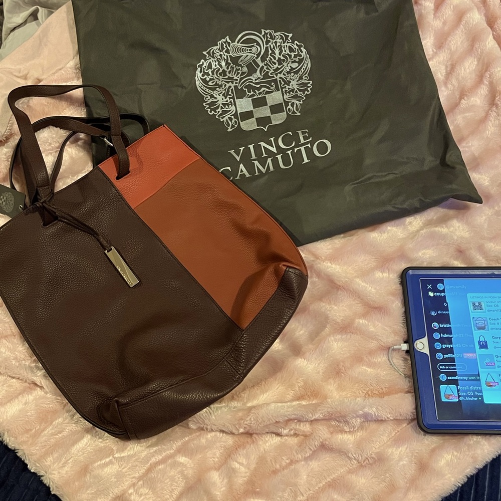 NWT large w/dust bag.   NEVER WORN RETAIL $198….temp.price cut for  auction